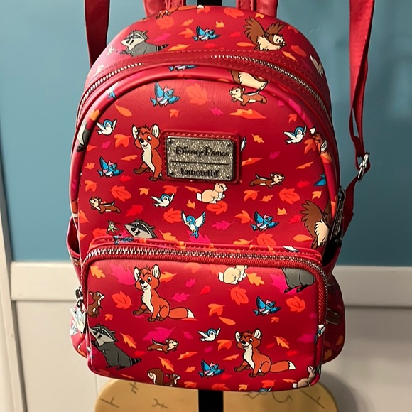 Loungefly Handbags - Disney Parks Loungefly critters backpack purse, red 🎒